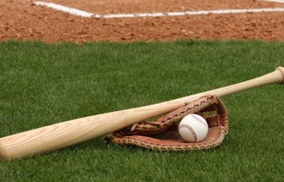 Baseball bat and Glove on the Ground